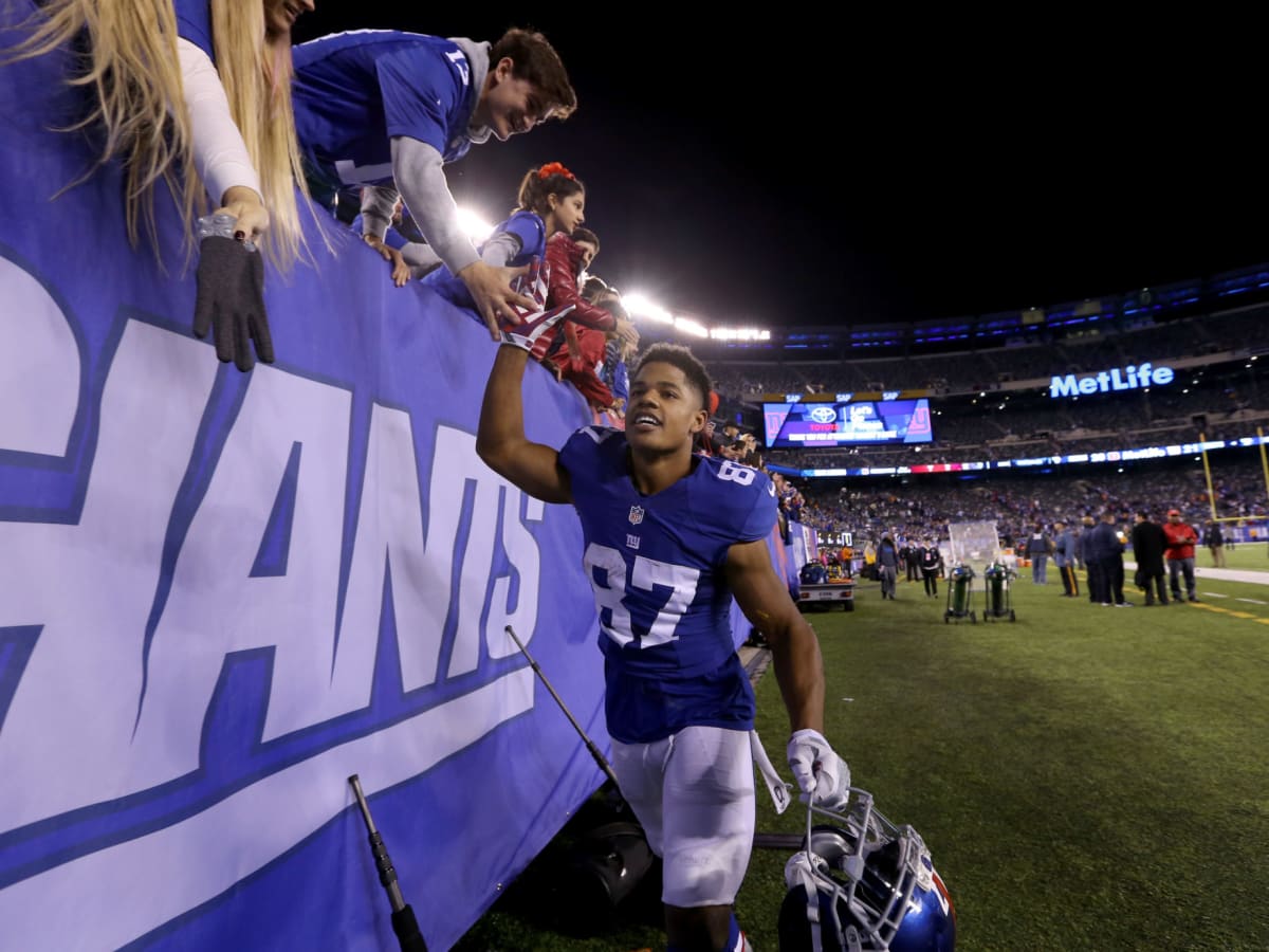 New York Giants wide receiver Sterling Shepard (87) celebrates with his  team after a 3-yard touchdown reception over the Washington Redskins during  the first half of an NFL game at FedEx Field