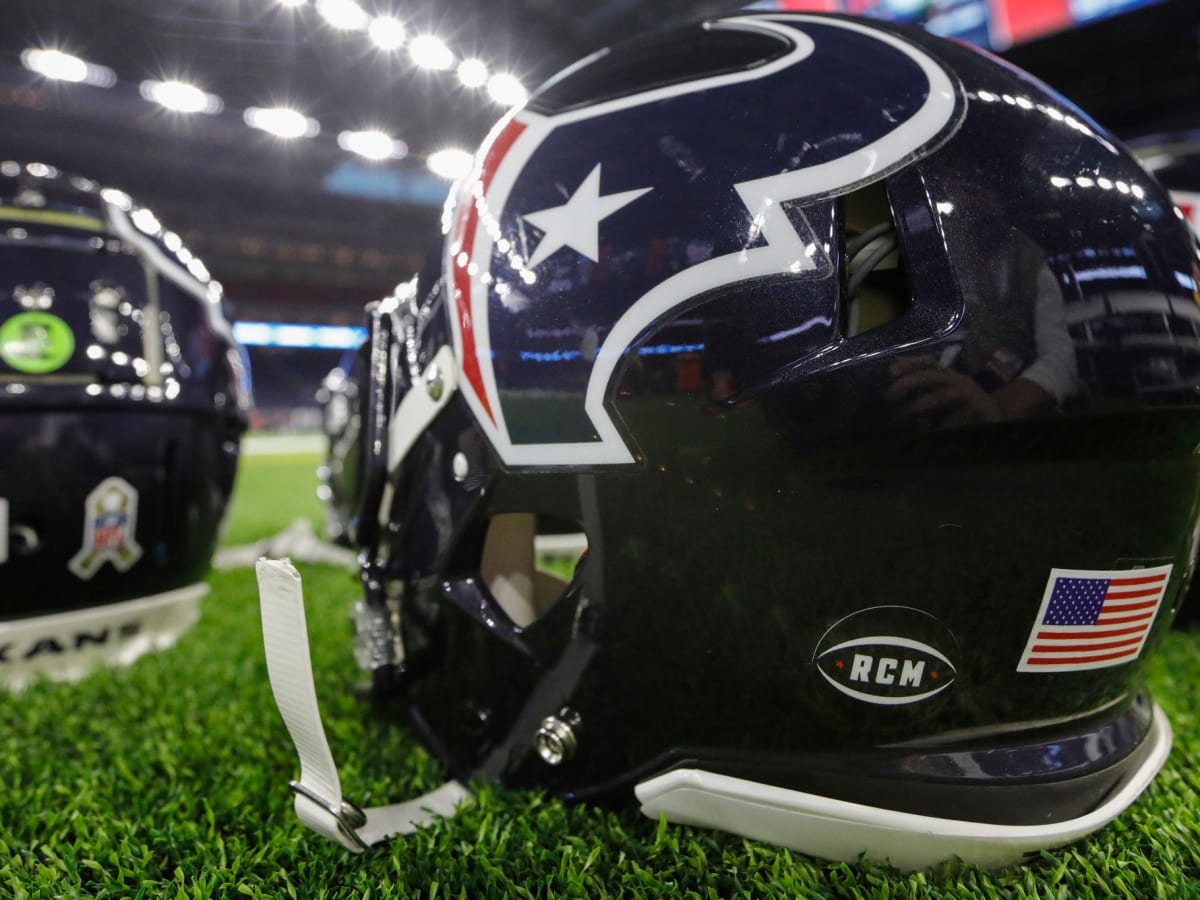 PHOTOS: Texans wear new Battle Red helmets during training camp