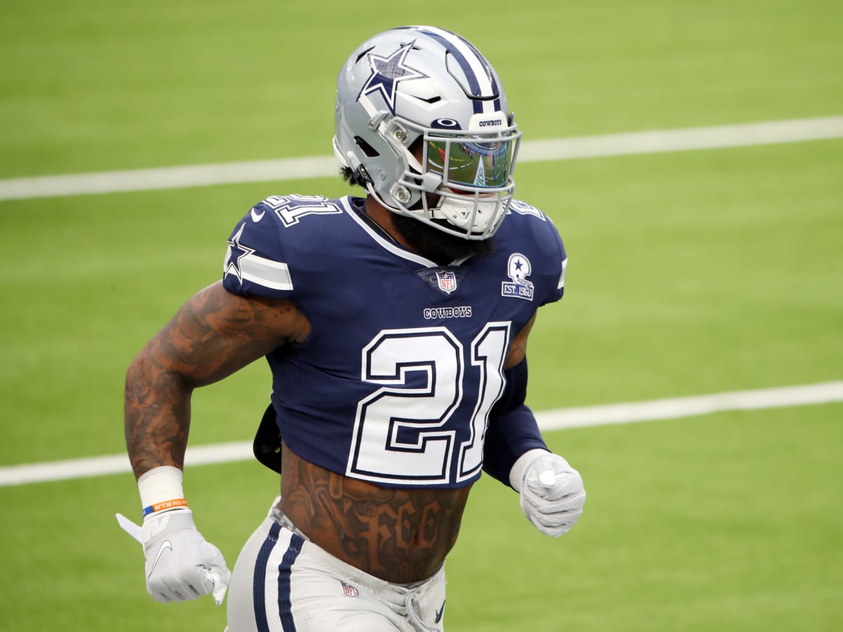 Ezekiel Elliott of the Dallas Cowboys warms up on the field prior