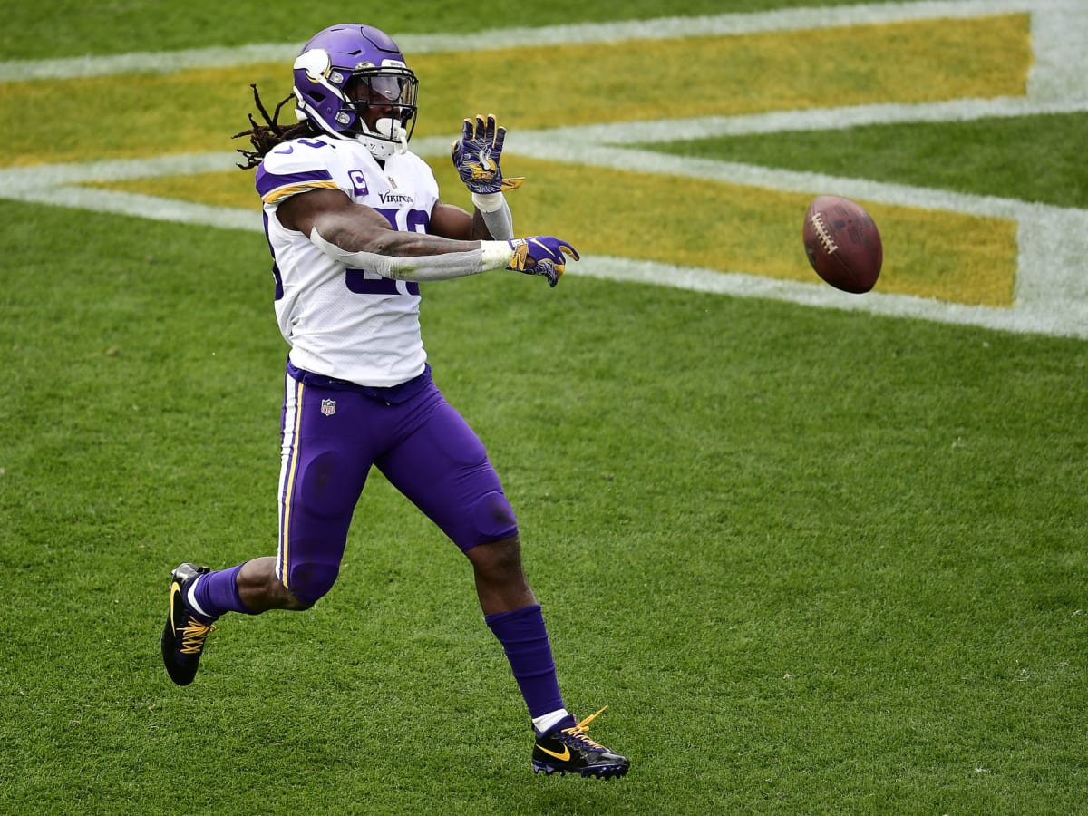 Minnesota Vikings running back Dalvin Cook walks on the field before an NFL  wild card playoff football game against the New York Giants, Sunday, Jan.  15, 2023, in Minneapolis. (AP Photo/Charlie Neibergall