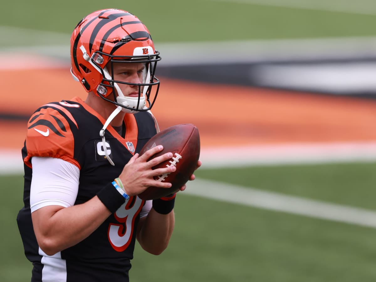 Joe Burrow survived an onslaught to lead the Bengals to the AFC
