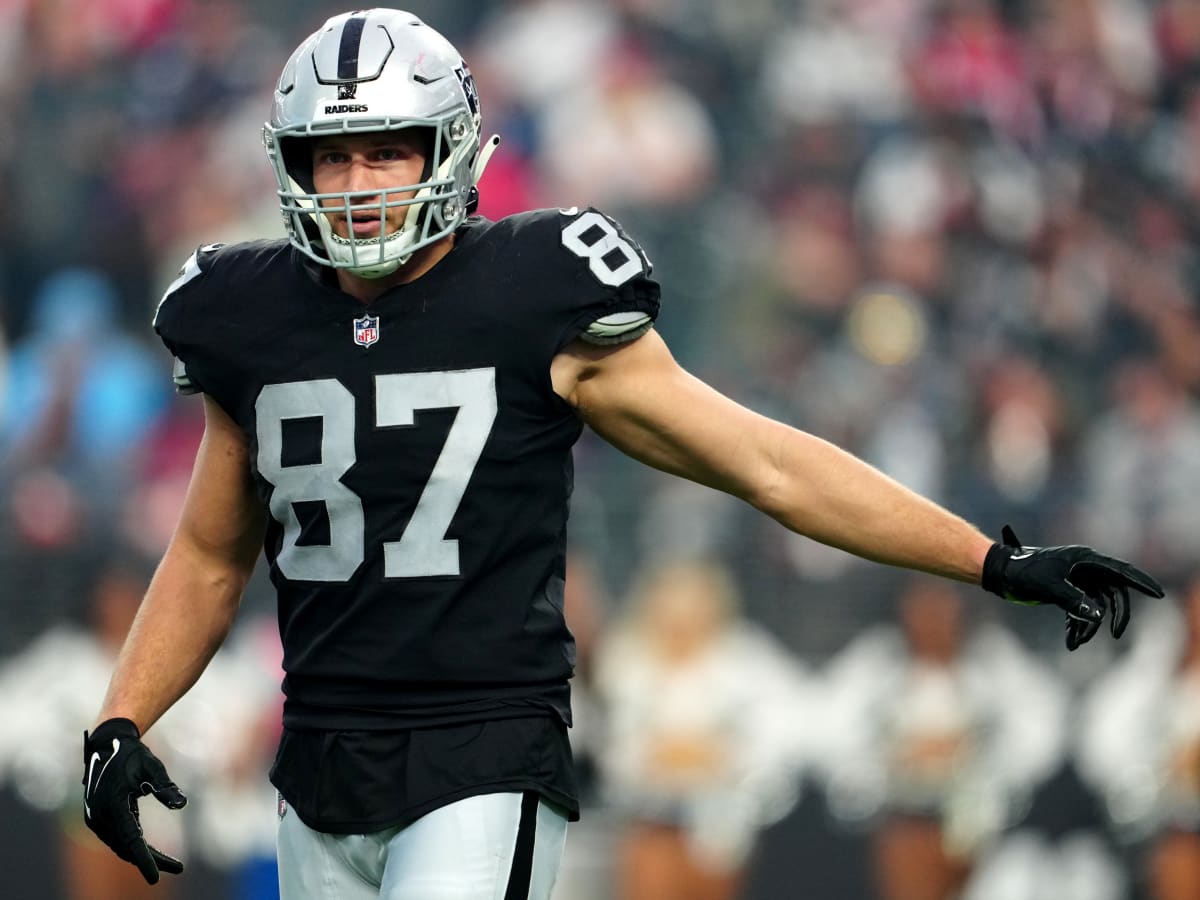 Raiders tight end Foster Moreau (87) gestures to a reporter during a news  conference after an N …