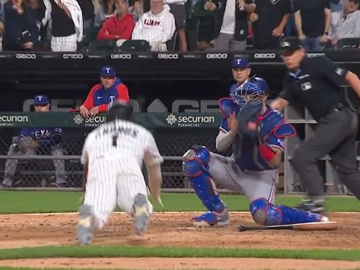 Rangers-White Sox controversial call: Why obstruction was called against Jonah  Heim, allowing Elvis Andrus to score