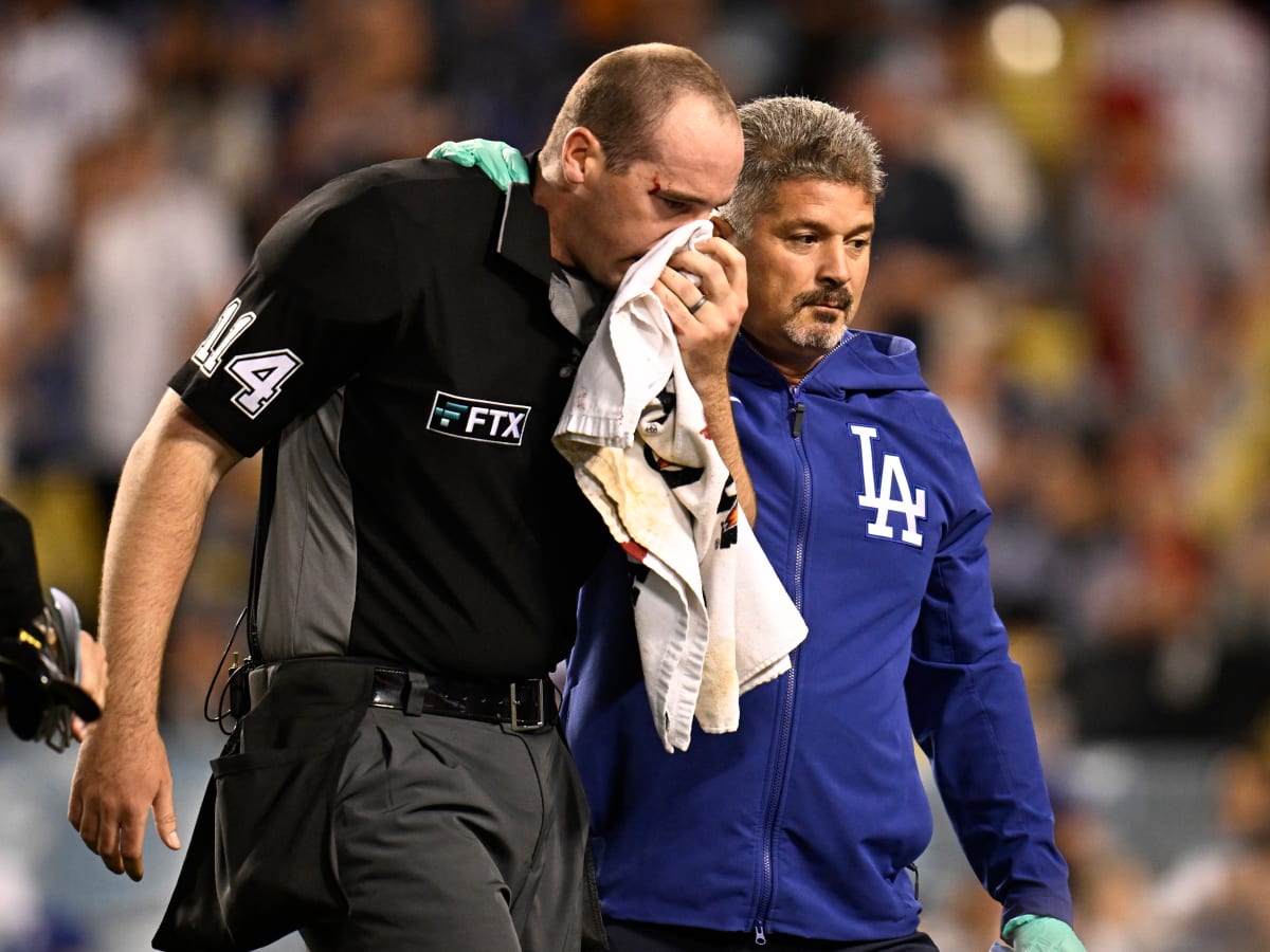 Umpire Exits Game After Being Struck in Face with Trout's Broken