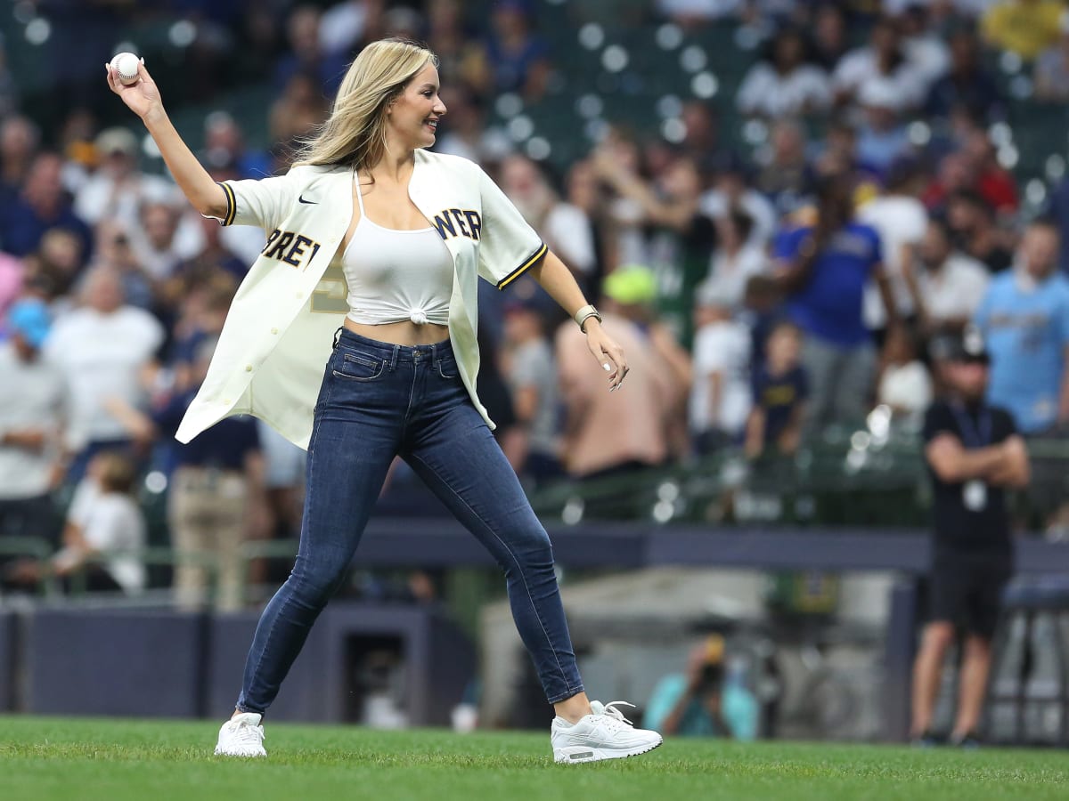 Paige Spiranac stuns baseball fans in unbuttoned shirt as she throws the  first pitch at the Milwaukee Brewers MLB game