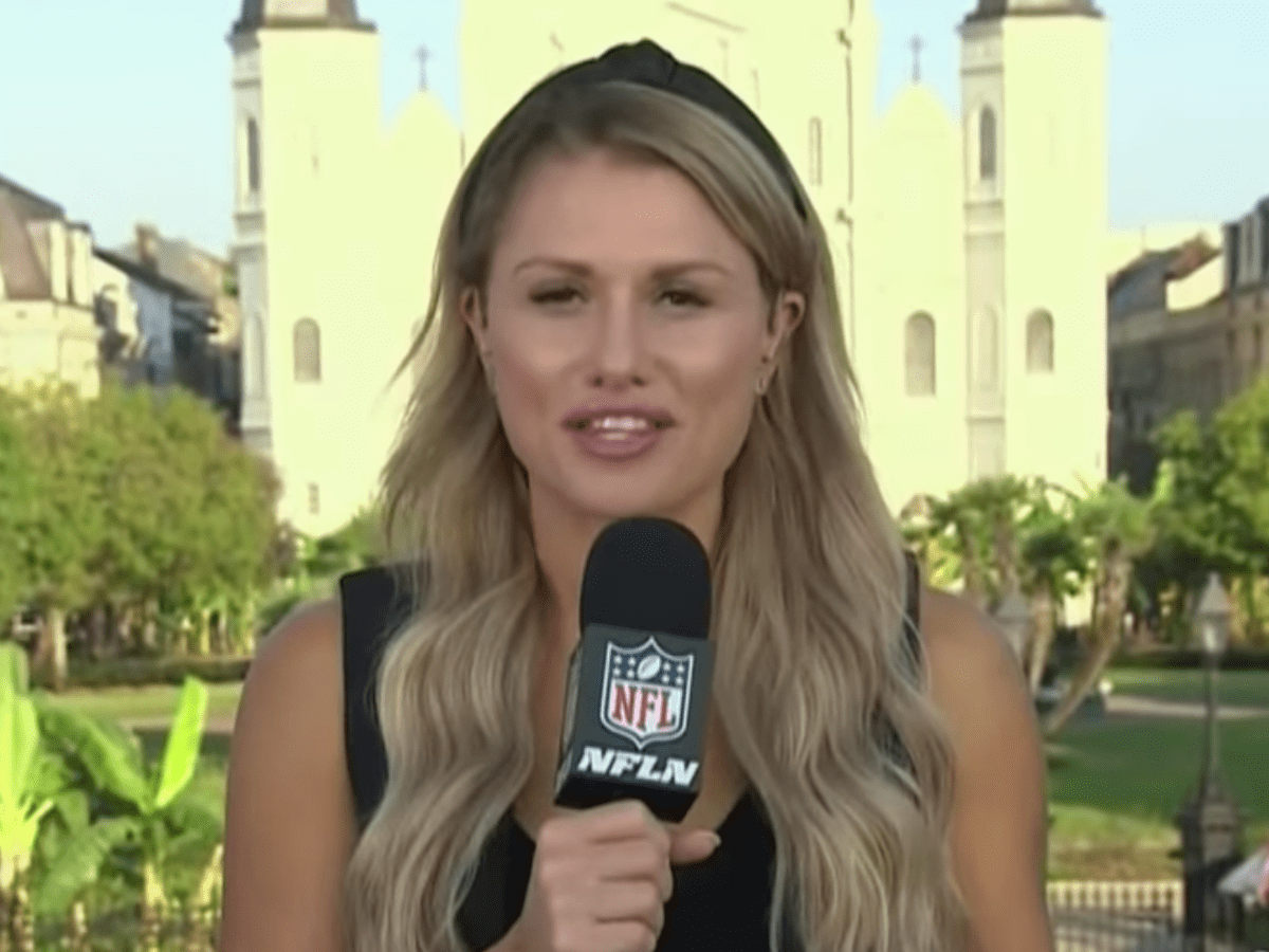 NFL network reporter Jane Slater poses after a report prior to an NFL  football game between the Carolina Panthers and the Dallas Cowboys, Sunday,  Oct. 3, 2021, in Arlington, Texas. (AP Photo/Matt