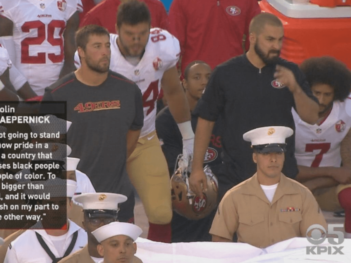 49ers safety Eric Reid kneels beside Colin Kaepernick for national anthem