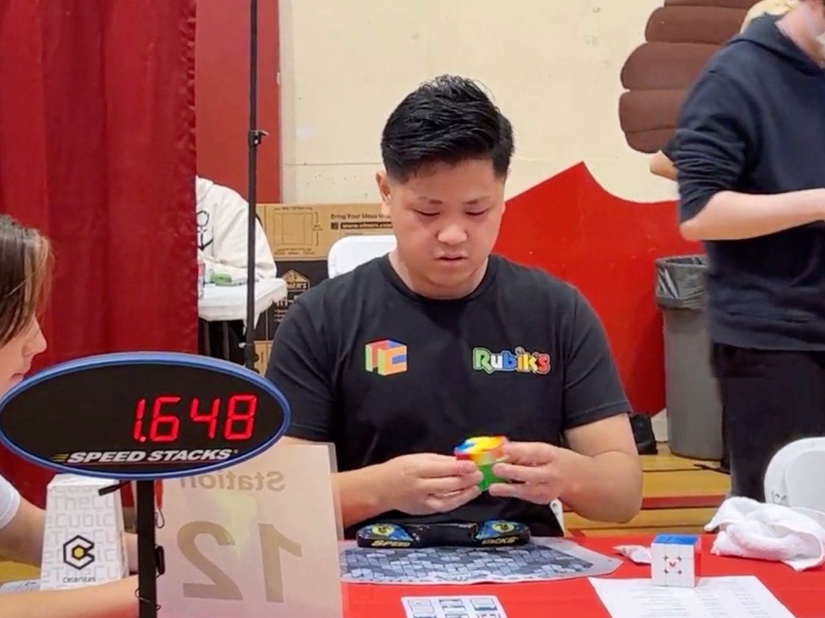 Teenager solves Rubik's Cube in 3.97 seconds, breaks record on camera