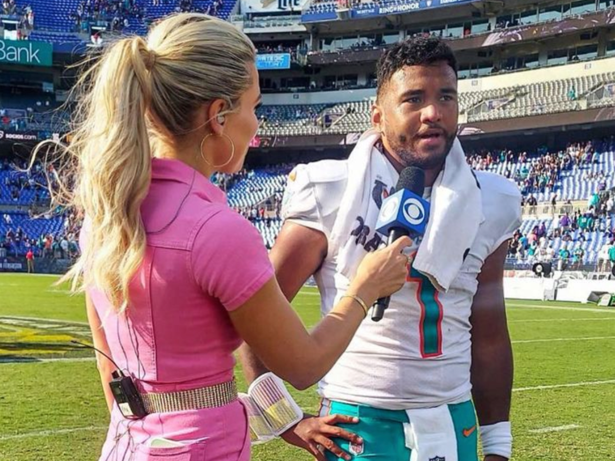 CBS Sports reporter Melanie Collins interviews Miami Dolphins