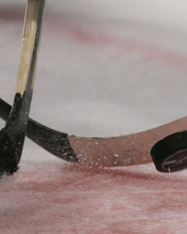 A generic photo of a hockey faceoff.