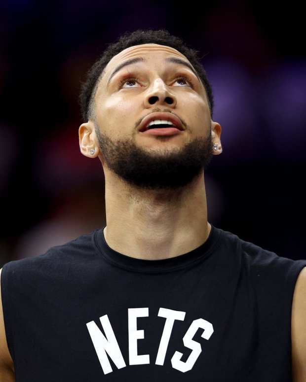 Ben Simmons looks on for the Nets.