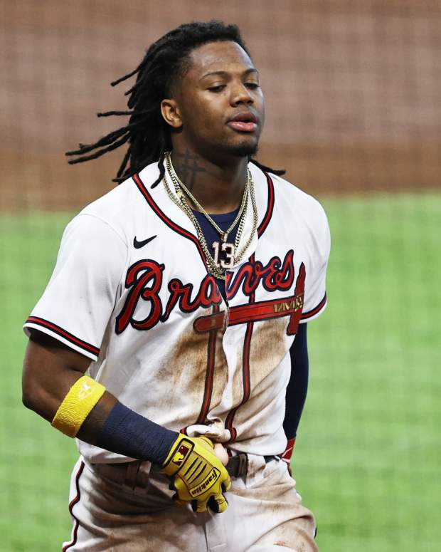 Atlanta Braves star outfielder Ronald Acuna Jr. gets hit by the Marlins.
