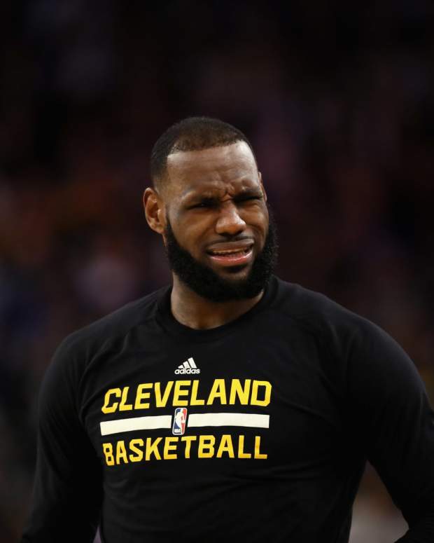 LeBron James of the Cleveland Cavaliers stands on the court during their game against the Golden State Warriors.