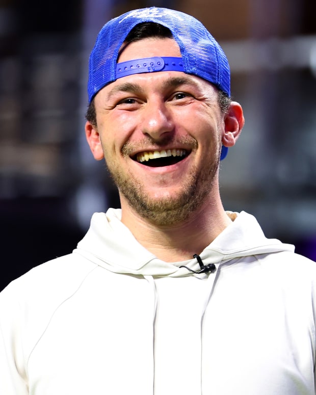 Johnny Manziel laughs on the field in the FCF League.