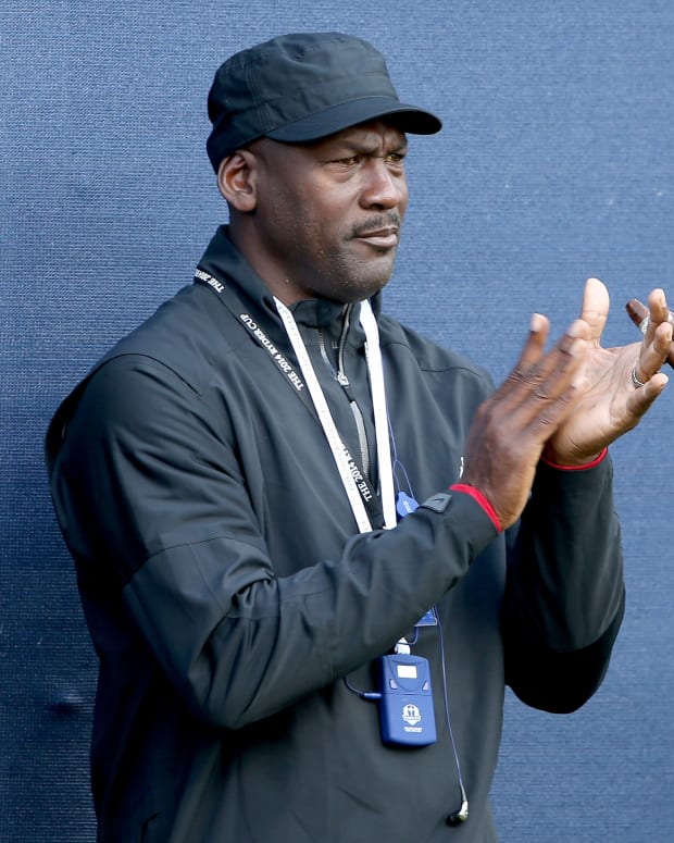 Michael Jordan watches golfers play at the Ryder Cup back in 2014.