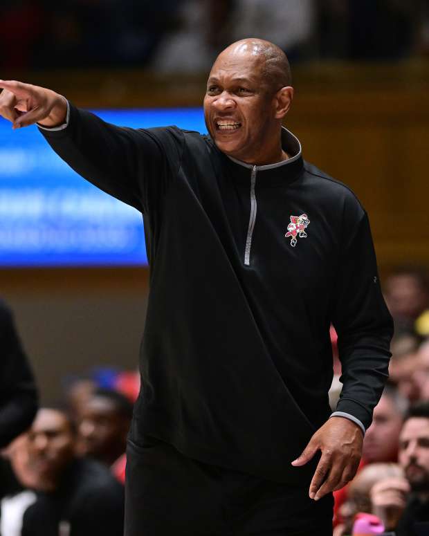 DURHAM, NORTH CAROLINA - FEBRUARY 28: Head coach Kenny Payne of the Louisville Cardinals watches his team play against the Duke Blue Devils during the game at Cameron Indoor Stadium on February 28, 2024 in Durham, North Carolina. (Photo by Grant Halverson/Getty Images)