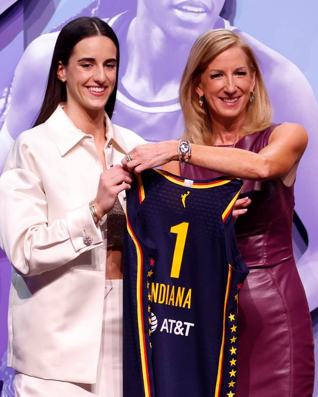 NEW YORK, NEW YORK - APRIL 15: Caitlin Clark poses with WNBA Commissioner Cathy Engelbert after being selected first overall pick by the Indiana Fever during the 2024 WNBA Draft at Brooklyn Academy of Music on April 15, 2024 in New York City. (Photo by Sarah Stier/Getty Images)