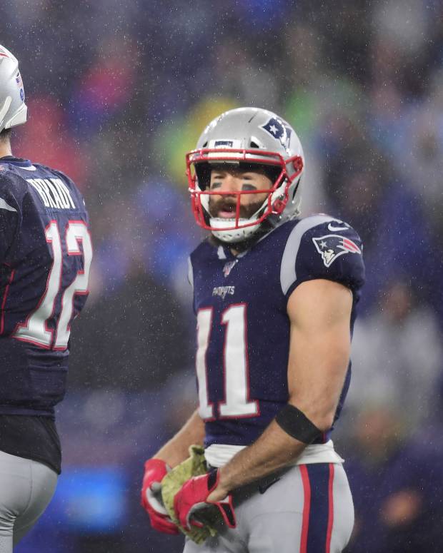 FOXBOROUGH, MASSACHUSETTS - NOVEMBER 24: Tom Brady #12 and Julian Edelman #11 of the New England Patriots reacts during the second half against the Dallas Cowboys in the game at Gillette Stadium on November 24, 2019 in Foxborough, Massachusetts. (Photo by Billie Weiss/Getty Images)