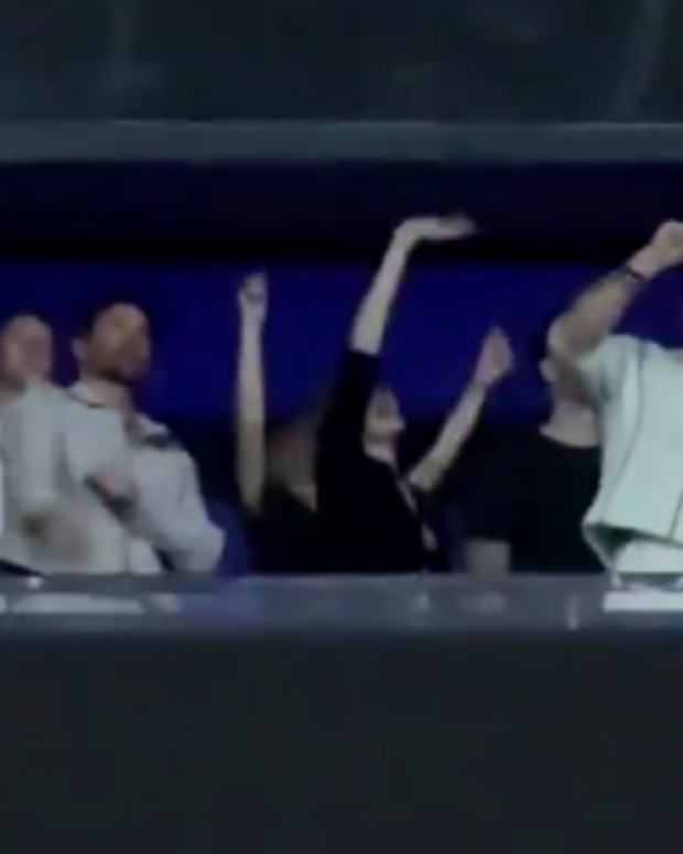 Travis Kelce dancing at the Taylor Swift concert in Paris.