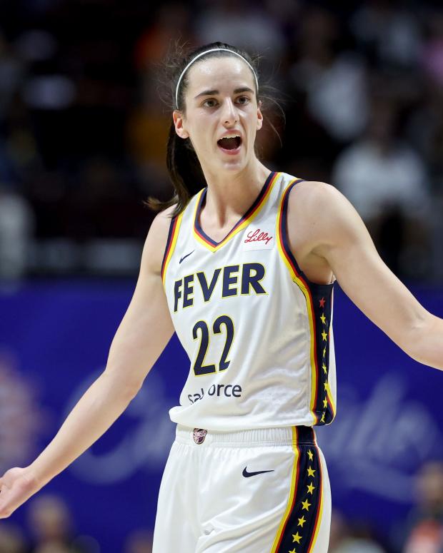 UNCASVILLE, CONNECTICUT - MAY 14: Caitlin Clark #22 of the Indiana Fever reacts after a foul during the first quarter against the Connecticut Sun in the game at Mohegan Sun Arena on May 14, 2024 in Uncasville, Connecticut. NOTE TO USER: User expressly acknowledges and agrees that, by downloading and or using this photograph, User is consenting to the terms and conditions of the Getty Images License Agreement. (Photo by Elsa/Getty Images)