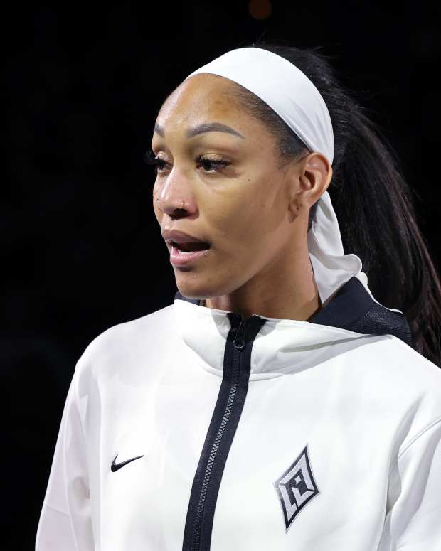 LAS VEGAS, NEVADA - MAY 14: A'ja Wilson #22 of the Las Vegas Aces stands on the court during a championship ring presentation and banner-raising ceremony for the 2023 WNBA championship before the team's home opener against the Phoenix Mercury on May 14, 2024 in Las Vegas, Nevada. NOTE TO USER: User expressly acknowledges and agrees that, by downloading and or using this photograph, User is consenting to the terms and conditions of the Getty Images License Agreement. (Photo by Ethan Miller/Getty Images)