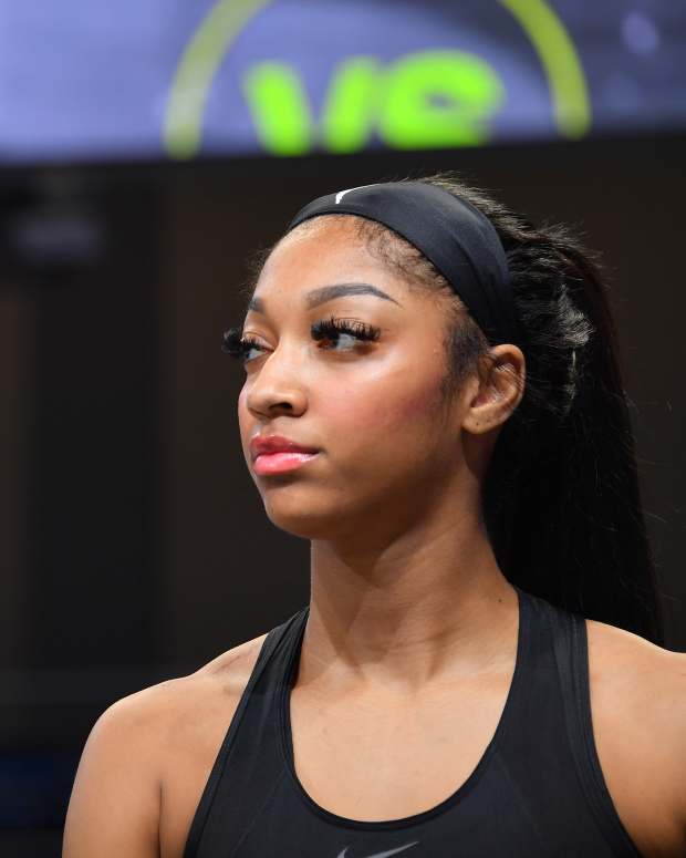 ARLINGTON, TX -  MAY 15: Angel Reese #5 of the Chicago Sky looks on before the game against the Dallas Wings on May 15, 2024 at the College Park Center in Arlington, TX. NOTE TO USER: User expressly acknowledges and agrees that, by downloading and or using this photograph, User is consenting to the terms and conditions of the Getty Images License Agreement. Mandatory Copyright Notice: Copyright 2024 NBAE (Photo by Michael Gonzales/NBAE via Getty Images)