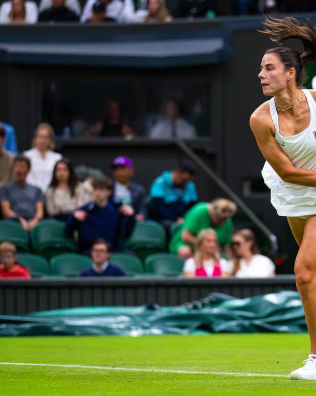 Emma Navarro hits during a match against Naomi Osaka.