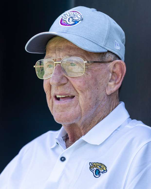 Lou Holtz looks on at training camp.