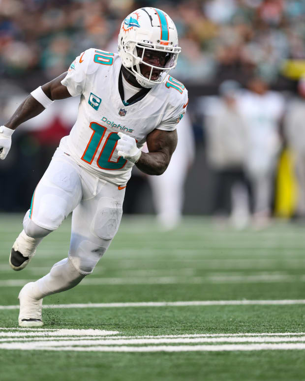 Dolphins receiver Tyreek Hill runs a route against the New York Jets.