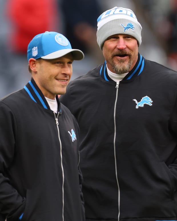 CHICAGO, ILLINOIS - DECEMBER 10: Offensive coordinator Ben Johnson and head coach Dan Campbell of the Detroit Lions look on prior to the game against the Chicago Bears at Soldier Field on December 10, 2023 in Chicago, Illinois. (Photo by Michael Reaves/Getty Images)