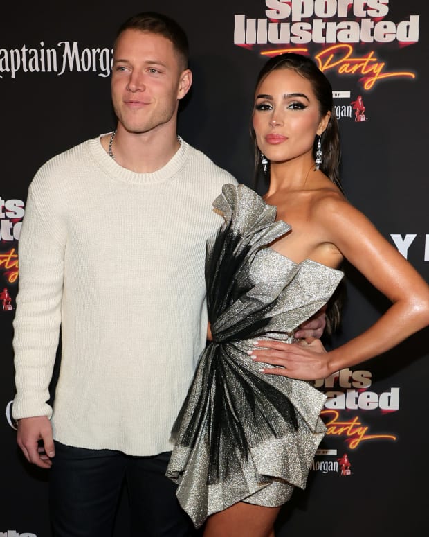SCOTTSDALE, ARIZONA - FEBRUARY 11: Christian McCaffrey (L) and Olivia Culpo attend the 2023 Sports Illustrated Super Bowl Party at Talking Stick Resort on February 11, 2023 in Scottsdale, Arizona. (Photo by Ethan Miller/Getty Images)