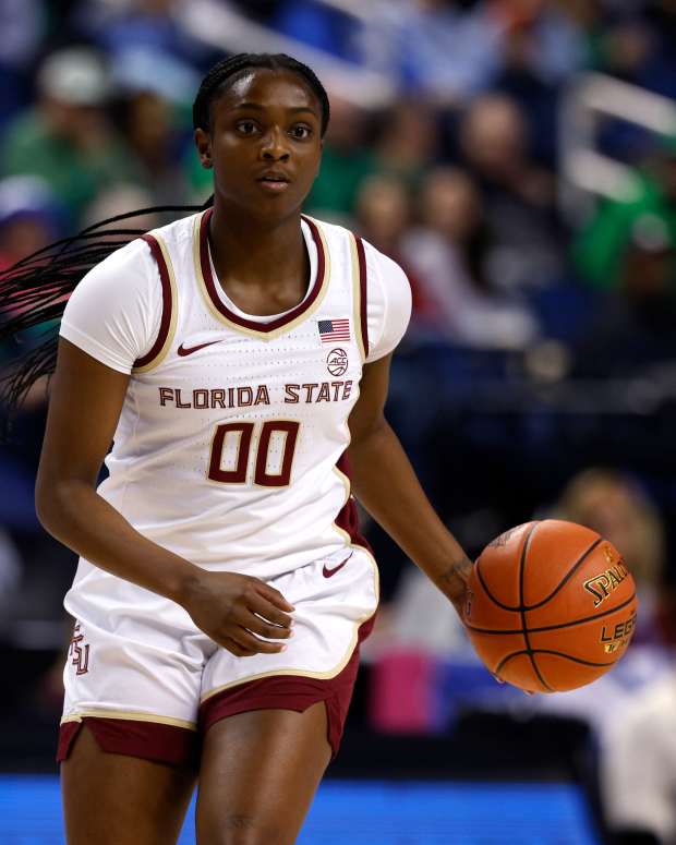 GREENSBORO, NORTH CAROLINA - MARCH 7: Ta'Niya Latson #00 of the Florida State Seminoles moves the ball during the first half against the North Carolina Tar Heels in a quarterfinals game of the ACC women's basketball tournament at First Horizon Coliseum on March 7, 2025 in Greensboro, North Carolina. (Photo by Lance King/Getty Images)