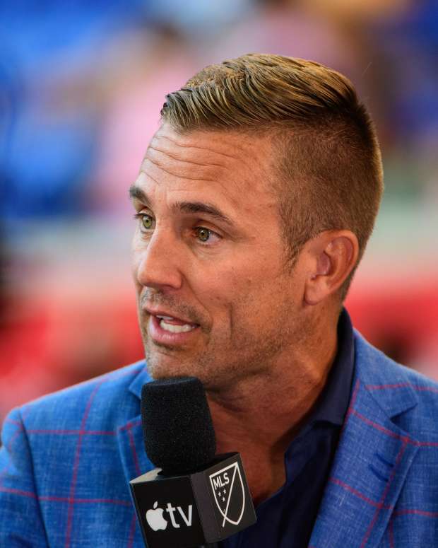 HARRISON, NJ - AUGUST 26: Apple TV lead MLS analyst Taylor Twellman speaks prior to a game between Inter Miami CF and New York Red Bulls at Red Bull Arena on August 26, 2023 in Harrison, New Jersey. (Photo by Howard Smith/ISI Photos/Getty Images).