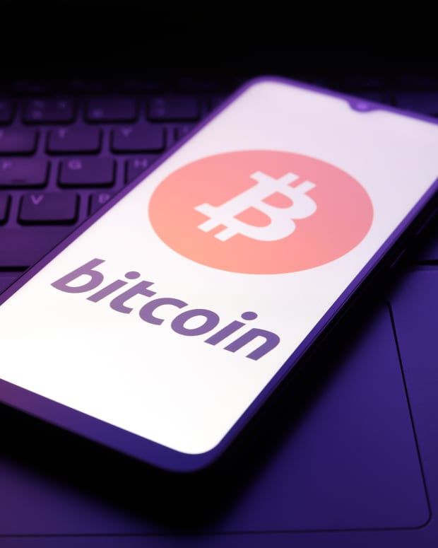 The Bitcoin logo appears on the screen of a smartphone in Reno, United States, on December 5, 2024. (Photo by Jaque Silva/NurPhoto via Getty Images)