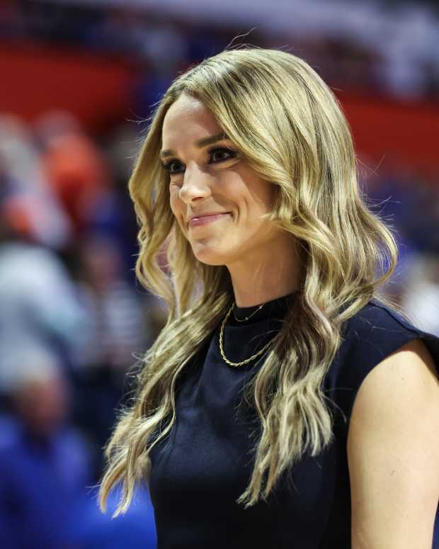 Molly McGrath covering basketball.