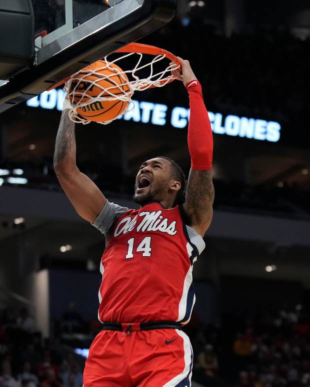 Ole Miss' Dre Davis dunks the ball in a game.
