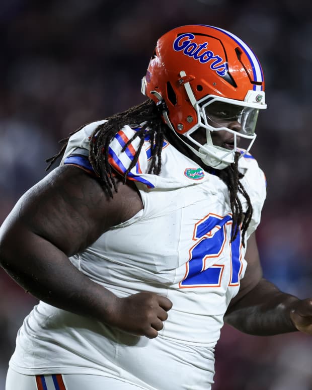 TALLAHASSEE, FLORIDA - NOVEMBER 30: Desmond Watson #21 of the Florida Gators looks on during the first half of a game against the Florida State Seminoles at Doak Campbell Stadium on November 30, 2024 in Tallahassee, Florida. (Photo by James Gilbert/Getty Images)