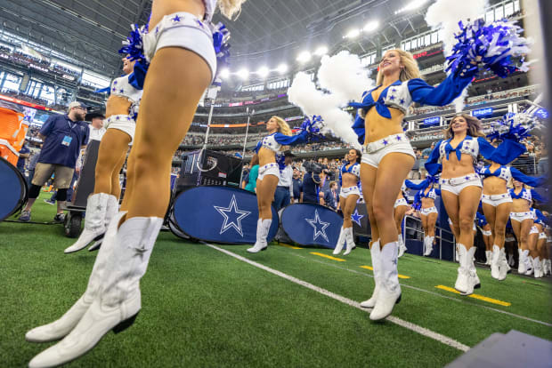 The Dallas Cowboys Cheerleaders perform wearing a holiday costume during an  NFL football game against the Tampa Bay Buccaneers on Sunday, Dec. 23,  2018, in Arlington, Texas. (AP Photo/Ron Jenkins Stock Photo 