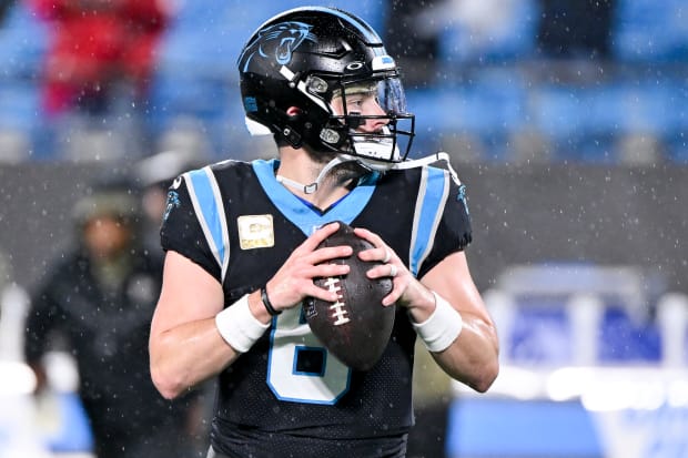 Carolina Panthers quarterback Baker Mayfield warms up before an