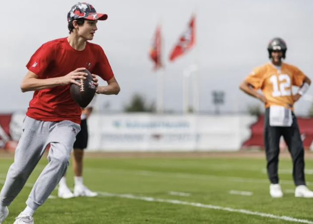 Tom Brady getting his son involved in football at a young age