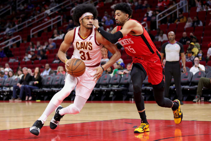 Cleveland Cavaliers center Jarrett Allen drives past a defender.
