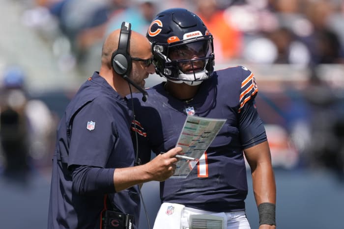 Bears head coach Matt Nagy stands alongside Justin Fields.