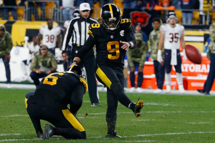 Chris Boswell kicks a field goal.
