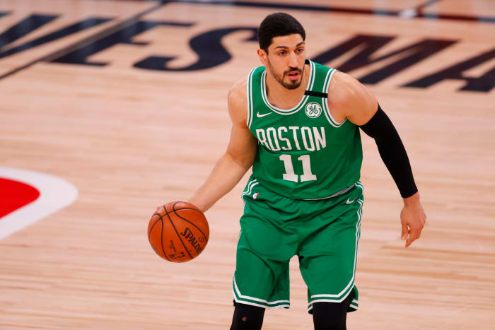 Boston Celtics center Enes Kanter Freedom handles the ball.