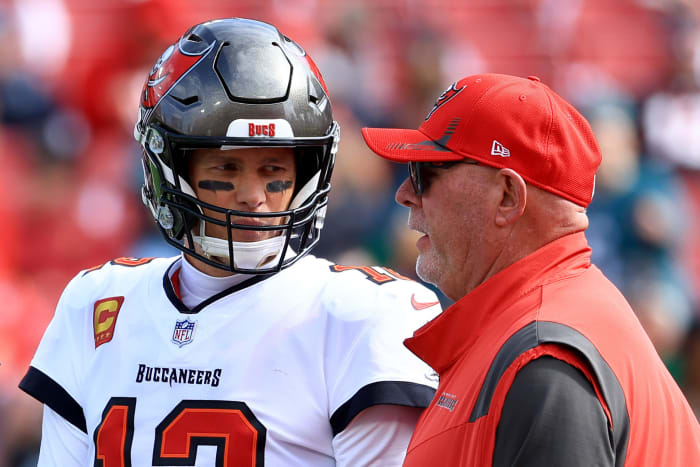 Tom Brady and Bruce Arians on the field.