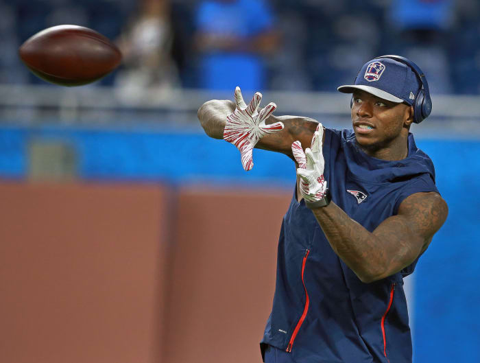 Josh Gordon catches a pass ahead of New England Patriots Vs Detroit Lions At Ford Field