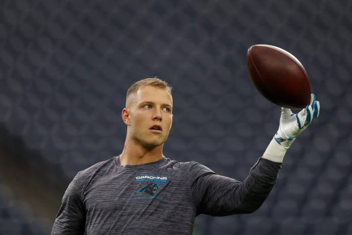 Christian McCaffrey warming up for the Panthers.