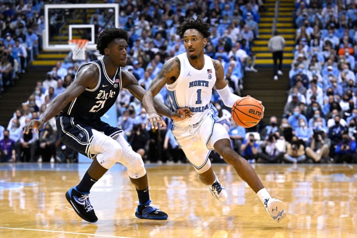 North Carolina forward Leaky Black drives against Duke forward A.J. Griffin.