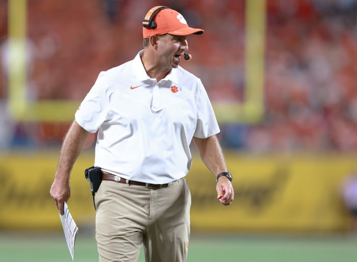 Clemson's Dabo Swinney walks down the sideline.