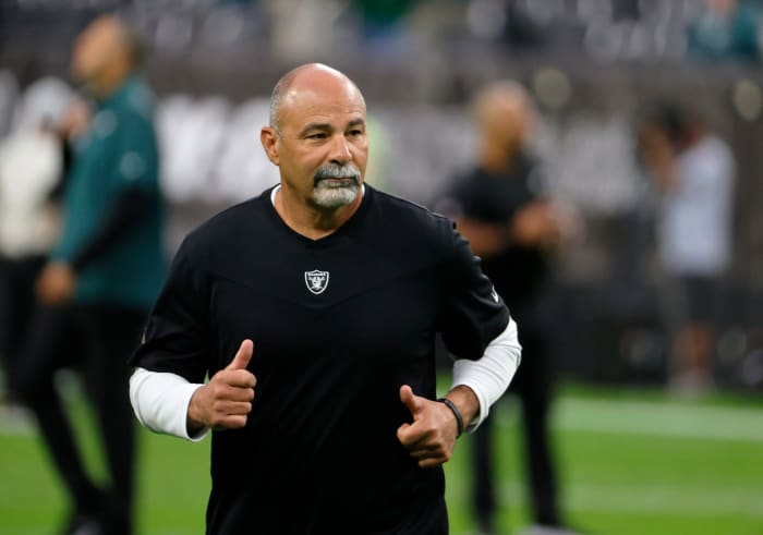Interim Raiders head coach Rich Bisaccia jogs off the field.